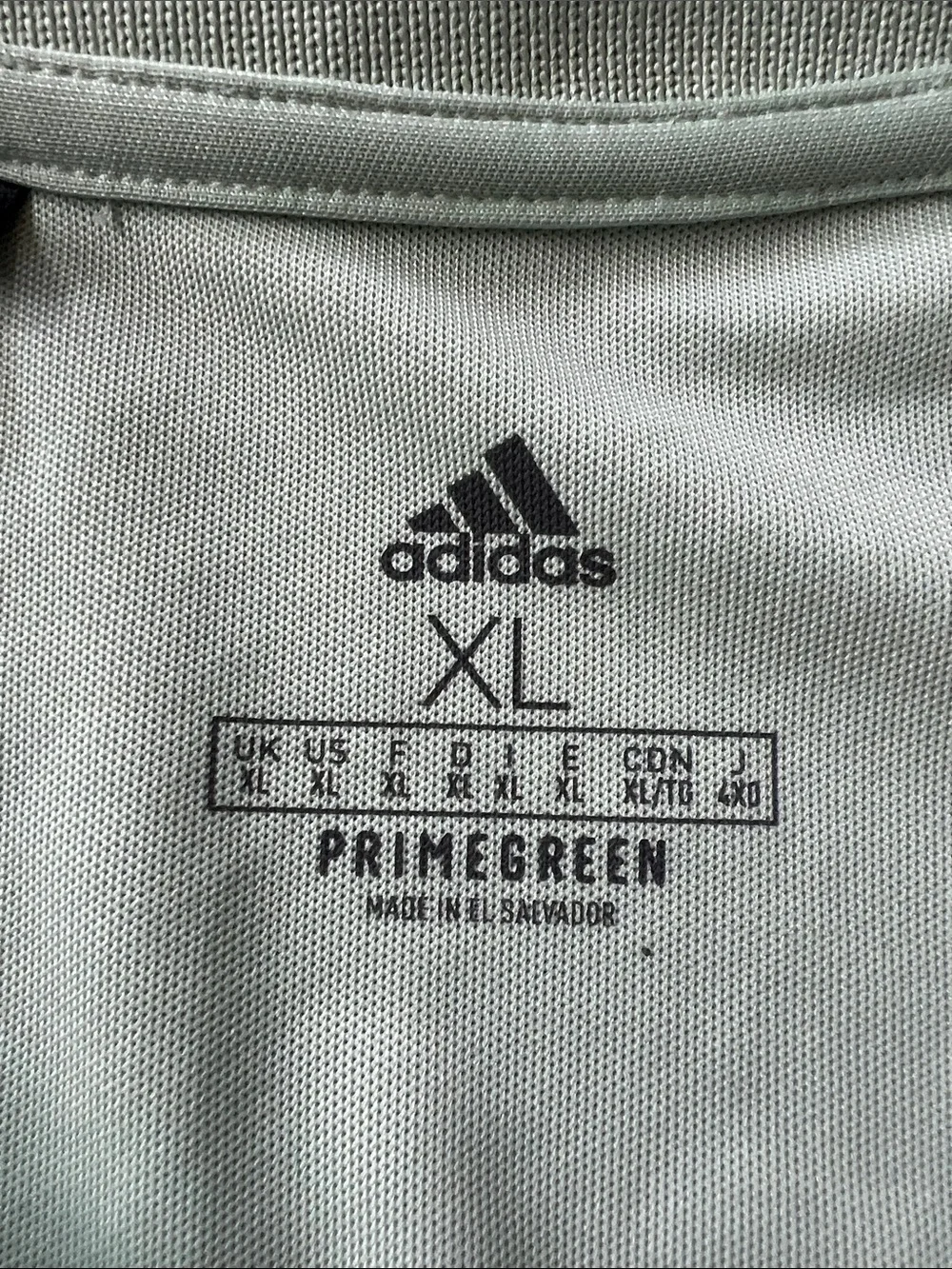 adidas Men’s light green Polo with Black Logo